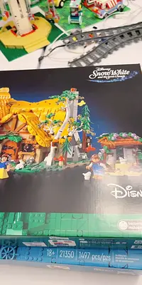 A LEGO Disney Snow White set box displayed among other LEGO creations.